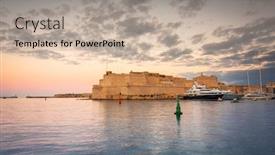  Presentation with malta - Presentation theme featuring beautiful-sunset-over-fort-saint background and a mint green colored foreground