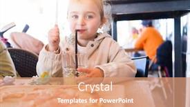 Presentation with baby sitting - PPT theme enhanced with beautiful toddler child girl sitting on baby highchair drinking juice using straw with happy face background and a coral colored foreground