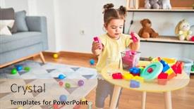  Presentation with wooden building blocks - Slide deck consisting of beautiful-toddler-playing-with-building background and a coral colored foreground