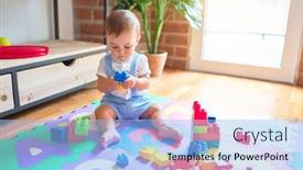  Presentation with building blocks - Audience pleasing PPT theme consisting of beautiful-toddler-sitting-on-puzzle backdrop and a light blue colored foreground