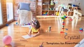  Presentation with unicorn - Amazing presentation theme having beautiful toddler wearing glasses and unicorn diadem lying down on the floor drawing using paper and pencil at kindergarten backdrop and a coral colored foreground