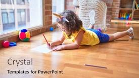  Presentation with unicorn - Cool new presentation with beautiful toddler wearing glasses and unicorn diadem lying down on the floor drawing using paper and pencil at kindergarten backdrop and a coral colored foreground