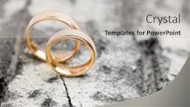  Presentation with wedding rings - Audience pleasing presentation theme consisting of beautiful-wedding-rings-on-wooden backdrop and a light gray colored foreground