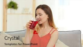  Presentation with juice - Audience pleasing PPT layouts consisting of beautiful woman drinking fresh juice backdrop and a coral colored foreground