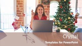  Presentation with hope - Presentation theme consisting of beautiful woman sitting at the table working with laptop at home around christmas tree gesturing finger crossed smiling with hope and eyes closed luck and superstitious concept background and a coral colored foreground