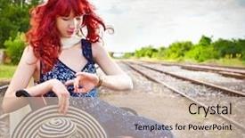  Presentation with station - Audience pleasing PPT theme consisting of beautiful woman with blue dress and suitcase on a train station backdrop and a soft green colored foreground