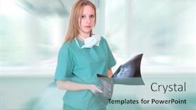  Presentation with xrays - Amazing PPT theme having beautiful young female doctor holding up xrays backdrop and a light blue colored foreground