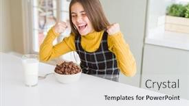  Presentation with chocolate milk - Audience pleasing slide set consisting of beautiful young girl kid eating chocolate cereals and glass of milk for breakfast very happy and excited doing winner gesture with arms raised smiling and screaming for success celebration concept backdrop and a white colored foreground