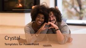  Presentation with hands heart - Presentation theme enhanced with beautiful young multiethnic couple with tablet computer showing a heart with their hands on the floor in front of fireplace at autumn day background and a coral colored foreground
