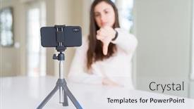  Presentation with recording - Cool new presentation theme with beautiful young woman recording selfie video with smartphone webcam with angry face negative sign showing dislike with thumbs down rejection concept backdrop and a light gray colored foreground