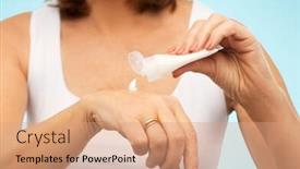  Presentation with cosmetics cream - Audience pleasing slide deck consisting of beauty cosmetics and bodycare concept - close up of senior woman applying hand cream over blue background backdrop and a coral colored foreground