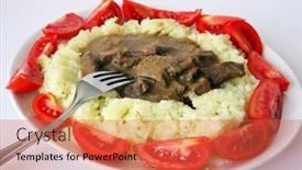  Presentation with wedges - Presentation theme having beef stroganoff served on a bed of creamed parsley potato ringed by wedges of small organic tomatoes background and a red colored foreground