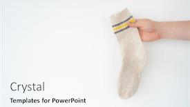  Presentation with light - Audience pleasing presentation design consisting of beige-woolen-sock-in-hand backdrop and a pink colored foreground