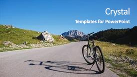  Presentation with green mountains - Colorful slide deck enhanced with bicycle parked on road leading towards green mountains backdrop and a teal colored foreground