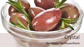  Presentation with color - Theme with big color olives in glass dish isolated over white background background and a coral colored foreground