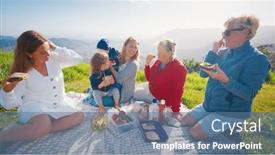  Presentation with green mountains - PPT theme with big-family-have-picnic background and a ocean colored foreground