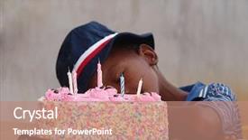  Presentation with birthday boy - Amazing PPT theme having birthday boy sleeping next to multicolor cake backdrop and a coral colored foreground
