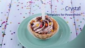  Presentation with cup cake - Colorful PPT theme enhanced with birthday cup cake with candle backdrop and a  colored foreground