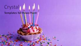  Presentation with birthday cake colorful candles - Audience pleasing presentation theme consisting of birthday cup cake with candles and colorful sparkles on purple background backdrop and a light blue colored foreground
