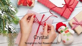  Presentation with gifs christmas - Slide deck consisting of birthday greeting card - female hands wrapping christmas gift background and a coral colored foreground
