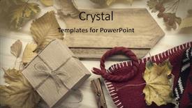  Presentation with still life crucifixion table - Theme having birthday november - autumn still life knitted cap background and a coral colored foreground