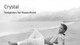  Presentation with fine art - Audience pleasing PPT theme consisting of black and white fine art portrait of a sexy young man in casual clothing lying on the beach backdrop and a white colored foreground