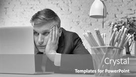  Presentation with overworked - Amazing presentation theme having black and white photo of overworked mature businessman looking at laptop on desk in office backdrop and a gray colored foreground