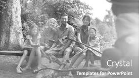  Presentation with black family - Cool new slide set with black and white photo of happy family roasting sausages over campfire at park backdrop and a gray colored foreground
