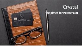  Presentation with banking - PPT theme having black-credit-card-on-office background and a dark gray colored foreground
