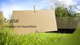  Presentation with text message - Presentation theme having blank cardboard sign on grass in nature ready for text message background and a coral colored foreground