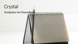  Presentation with white blank notebook silver - Cool new PPT theme with blank destop calendar with pencil backdrop and a  colored foreground