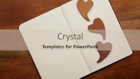  Presentation with hearts - Slides consisting of blank notebook with three hearts on the wooden background background and a soft green colored foreground