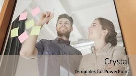  Presentation with creative writing - PPT theme enhanced with business startup planning management and people concept - happy creative team writing or drawing something on blank office glass board background and a mint green colored foreground