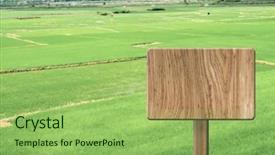  Presentation with rural - Theme with blank wooden sign on field background and a seafoam green colored foreground
