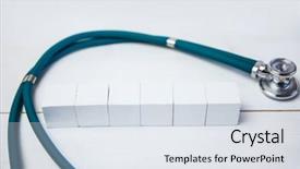  Presentation with tv show studio camera - Amazing PPT theme having blocks with stethoscope on desk backdrop and a sky blue colored foreground