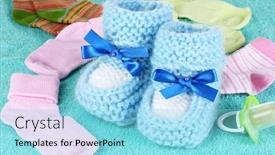  Presentation with socks - Amazing presentation theme having blue-baby-booties-socks backdrop and a arctic colored foreground
