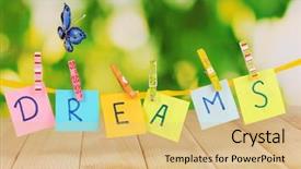  Presentation with dreams - PPT theme enhanced with blue butterfly - word dreams on wooden table background and a yellow colored foreground