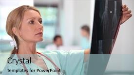  Presentation with fracture bone - Cool new PPT theme with bone fracture - nurse looking at x-ray backdrop and a light blue colored foreground