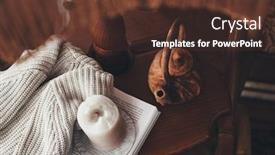  Presentation with resting place - Audience pleasing presentation theme consisting of book candle teapot and sweater on coffee table in wooden house cozy place for reading and resting at home backdrop and a tawny brown colored foreground