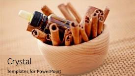  Presentation with essential oil - Theme consisting of bottle of cinnamon essential oil - beauty treatment background and a coral colored foreground