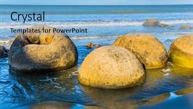 Presentation with boulder - Amazing PPT theme having boulders moeraki - spherical boulders backdrop and a light blue colored foreground