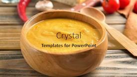  Presentation with lentils - Theme having bowl of homemade lentils creme soup on wooden table background and a yellow colored foreground