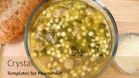  Presentation with restaurant kitchen - Cool new presentation with bowl of hot italian wedding soup meatballs and spinach soup in kitchen or restaurant backdrop and a gold colored foreground