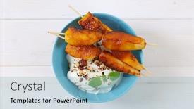  Presentation with yogurt - Beautiful presentation theme featuring bowl of pear and orange skewers with yogurt chopped nuts and almonds backdrop and a light blue colored foreground