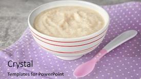  Presentation with baby food - Theme having bowl with porridge for baby background and a light blue colored foreground