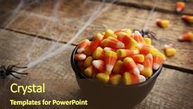  Presentation with halloween - PPT layouts having bowl with tasty halloween candies background and a tawny brown colored foreground
