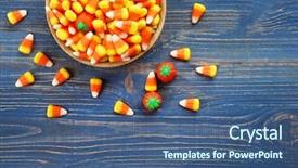  Presentation with halloween - PPT theme featuring bowl with tasty halloween candies background and a  colored foreground