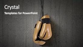  Presentation with nail - Presentation theme enhanced with boxing gloves hanging on nail on wall background and a dark gray colored foreground
