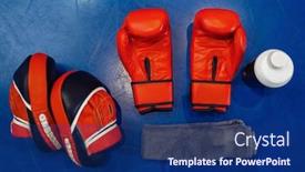  Presentation with boxing ring - Presentation theme featuring boxing-gloves-pads-and-equipment background and a navy blue colored foreground