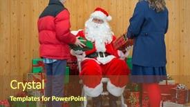  Presentation with christmas girl - Theme with boy and a girl receiving christmas gifts from santa in his grotto background and a tawny brown colored foreground